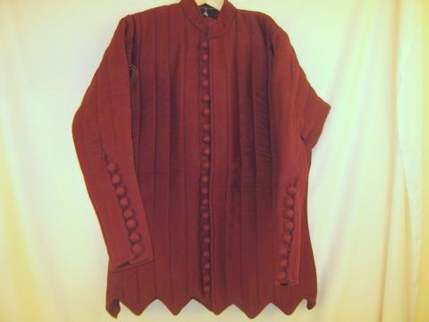 Gambeson with cloth covered wooden buttons | Late 14th C. | Color red